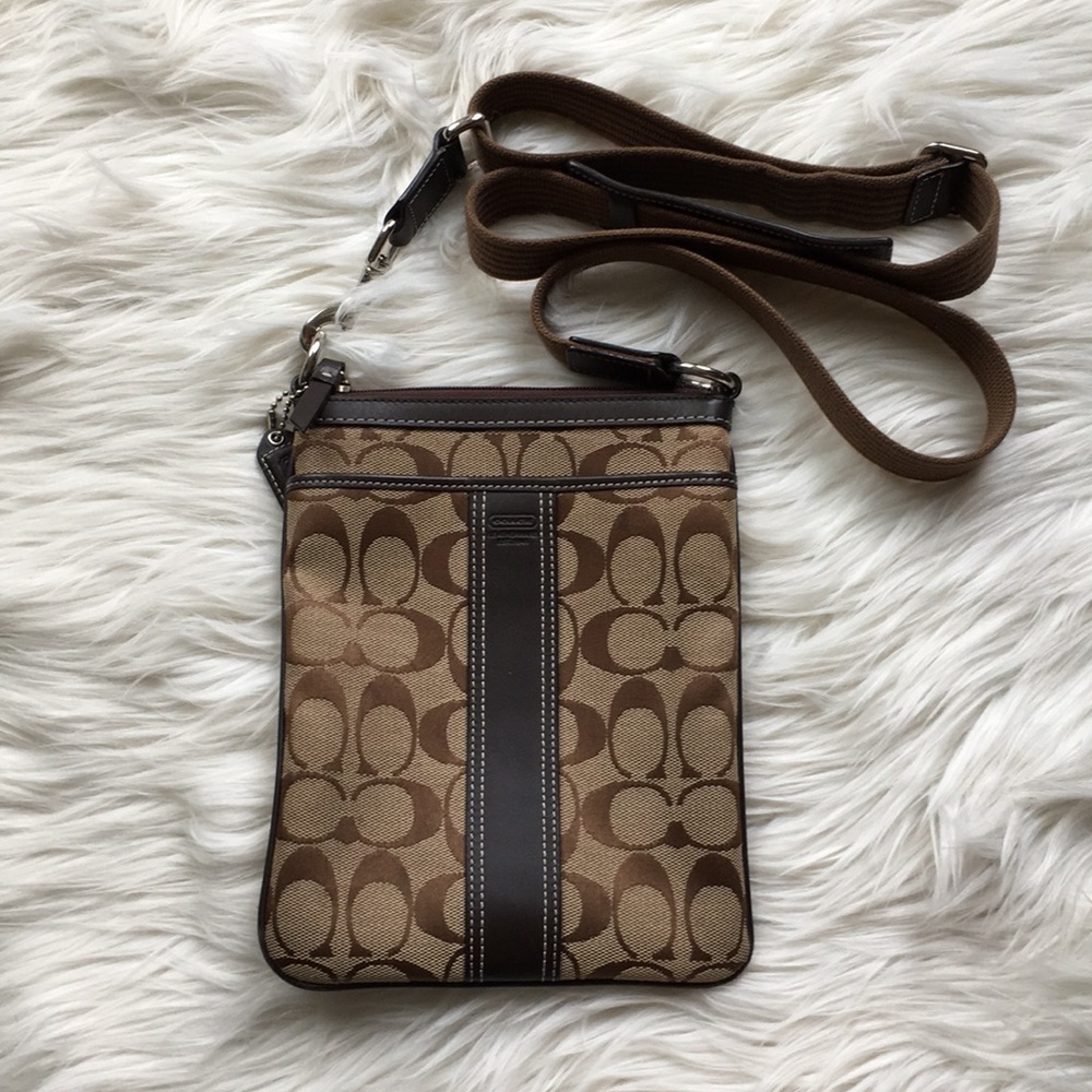 Authentic Coach cross body woven/leather bag.